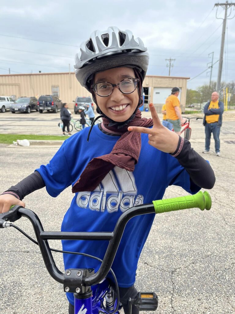 Madinah girl stoked about her new bike