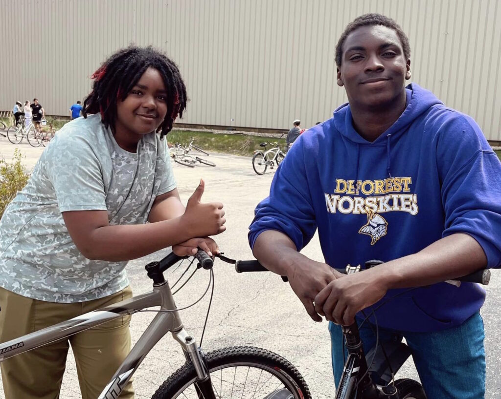 two cool guys with bikes CROPPED