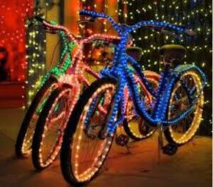 bicycles with holiday lights on them