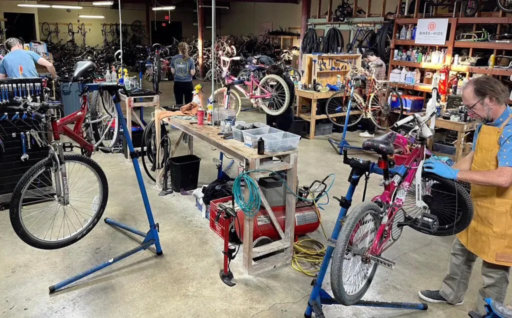 volunteers working on bikes