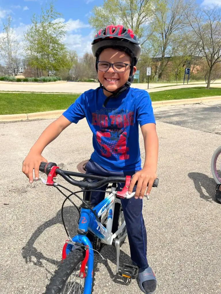 happy boy just received his bike
