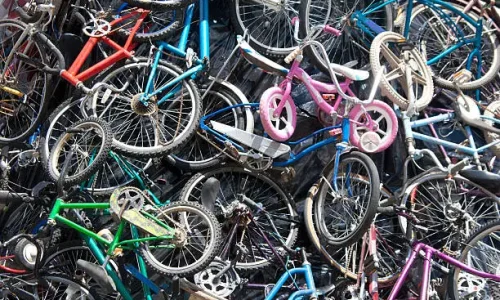 photo of a pile of junk bikes - a boneyard