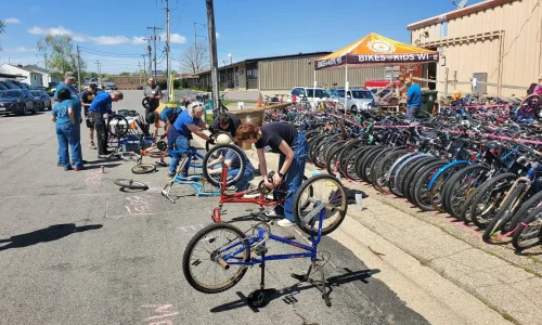 Big Breakdown event with people breaking down bikes at the big breakdown event
